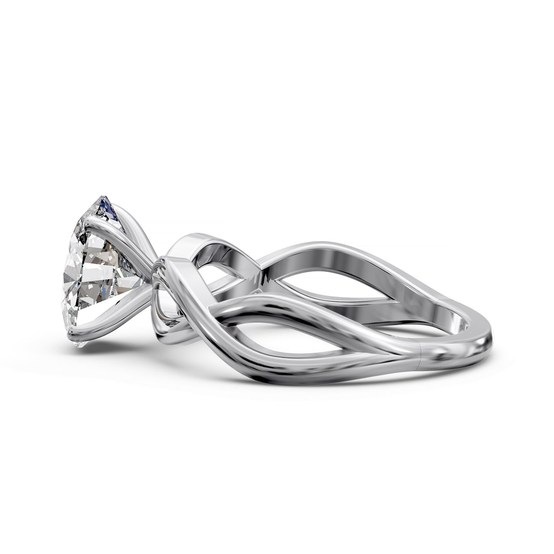 Oval diamond engagement ring with sculpted twisted band design.