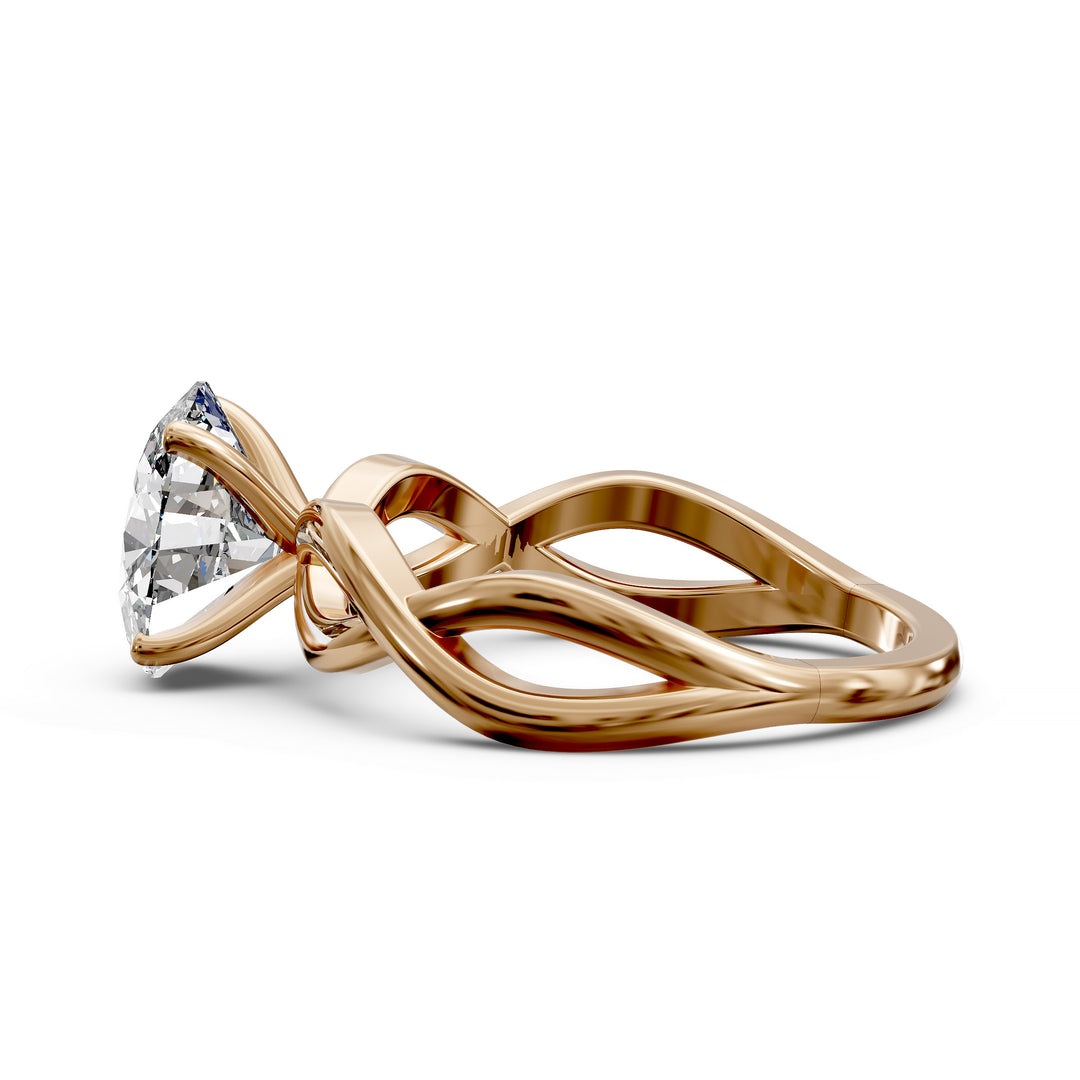 Oval diamond engagement ring with sculpted twisted band design.