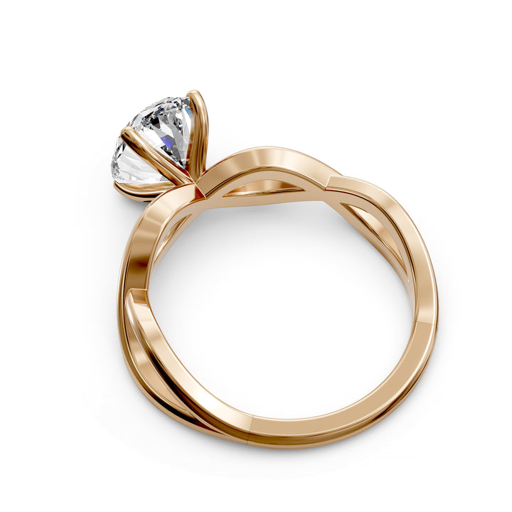 Oval diamond engagement ring with sculpted twisted band design.