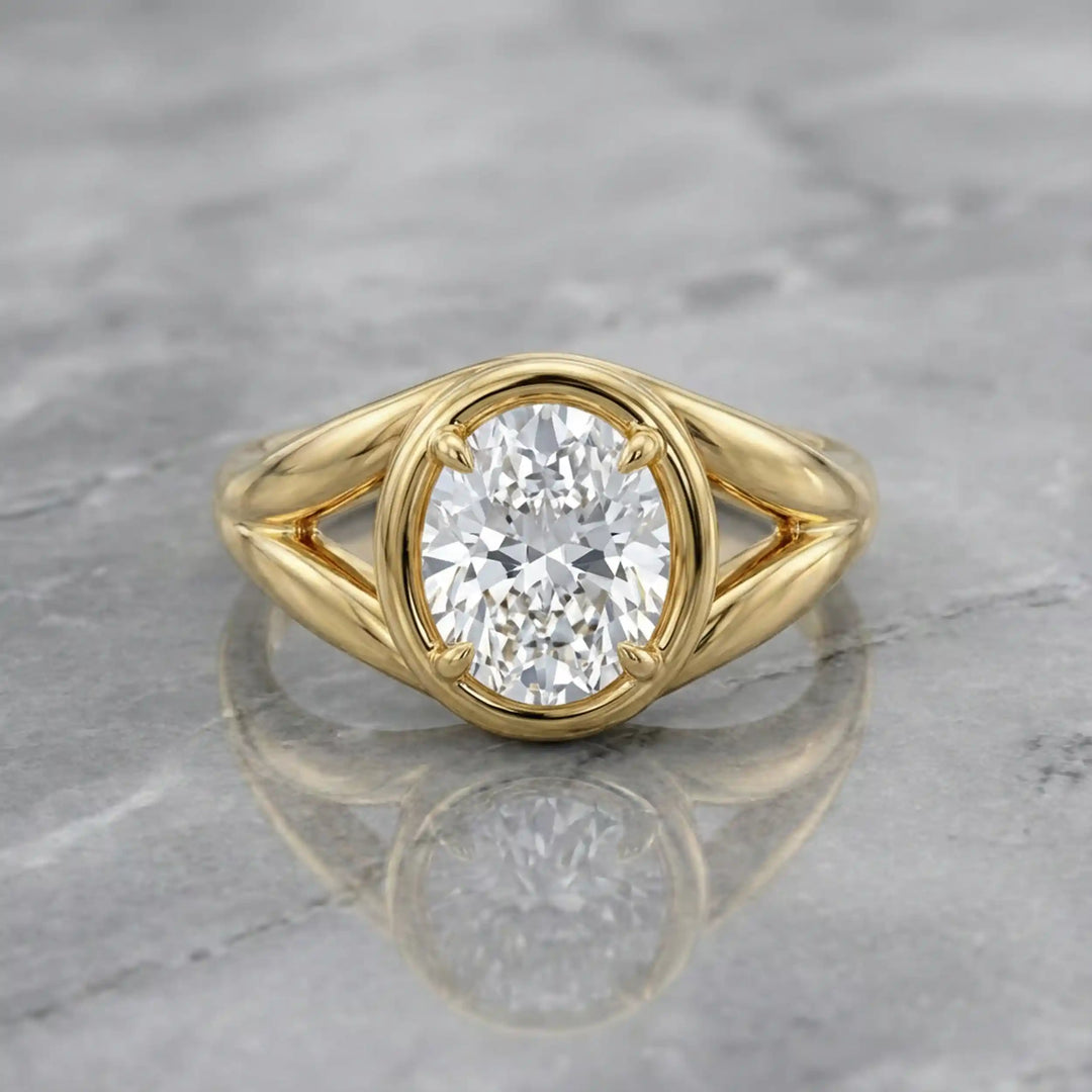 Oval lab-grown diamond cathedral solitaire engagement ring displayed on stone surface.
