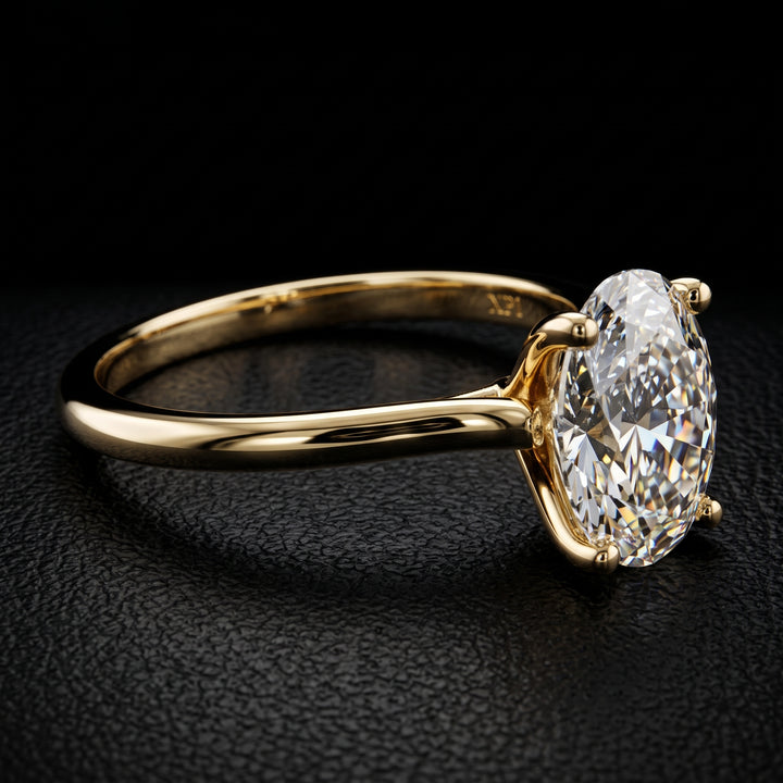 1.37 carat oval lab-grown diamond solitaire engagement ring displayed on a black jewelry background.