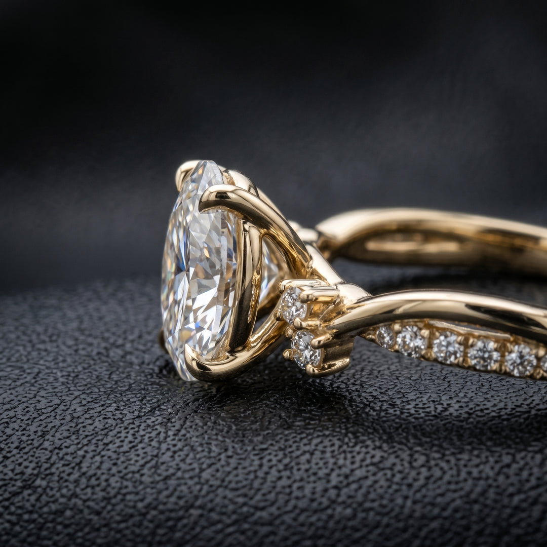 1 carat oval lab-created diamond engagement ring with a twisted gold band and diamond accents