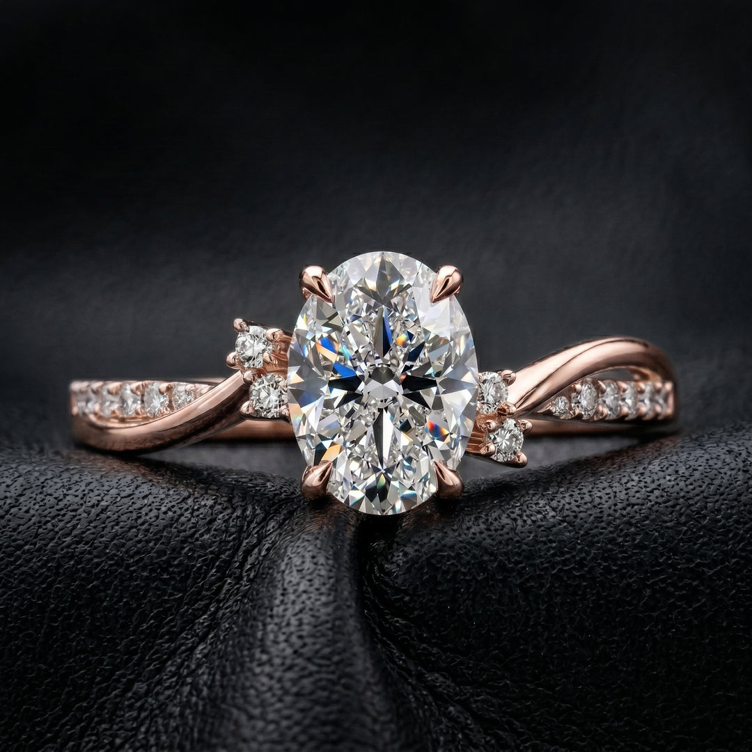 1 carat oval lab-created diamond engagement ring with a twisted gold band and diamond accents