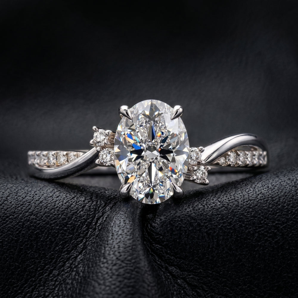 1 carat oval lab-created diamond engagement ring with a twisted gold band and diamond accents