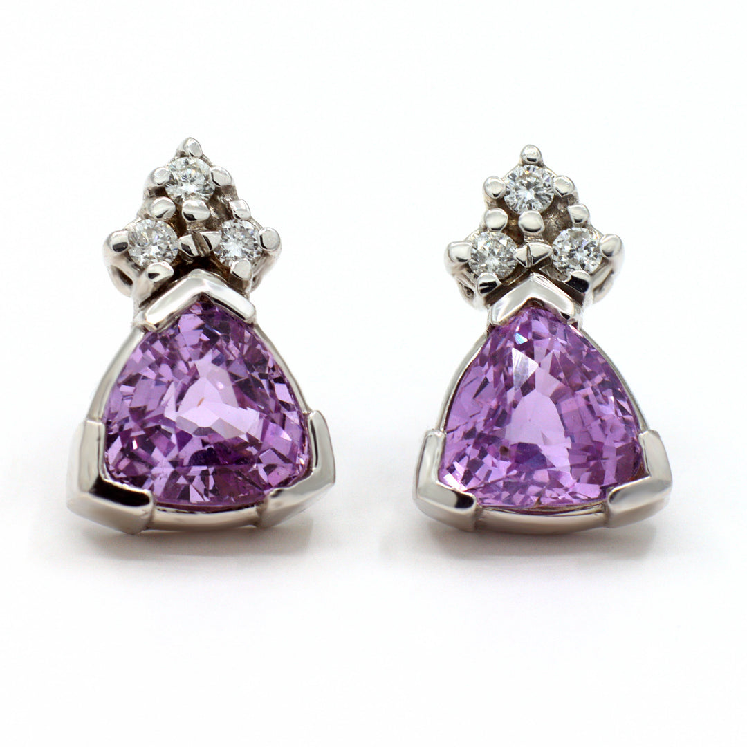 Trillion-cut purple sapphire and diamond stud earrings set in 14K white gold.