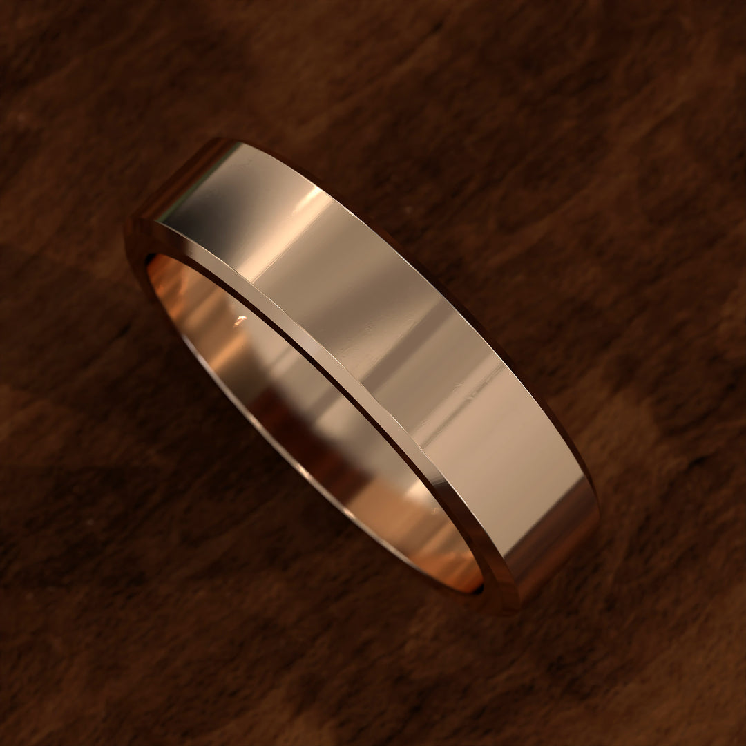 Polished flat men’s wedding band with beveled edges