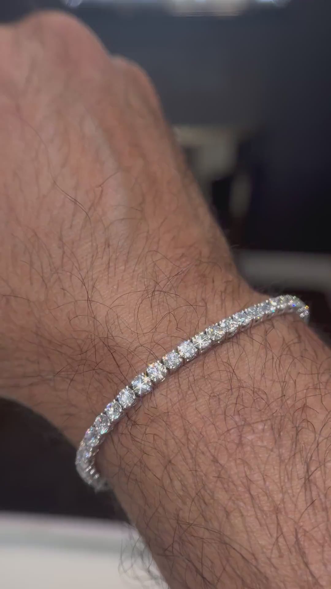 Second video of the 8.25 carat tennis bracelet on a man’s wrist