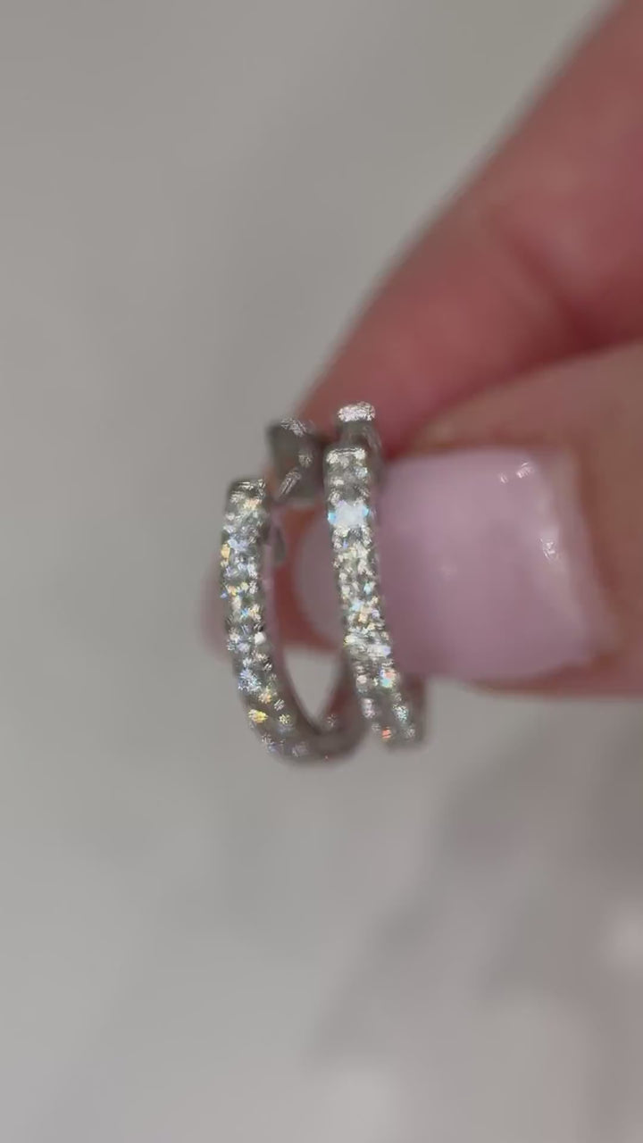 Video of RUDIX 18k white gold natural diamond huggie hoop earrings — muted product clip