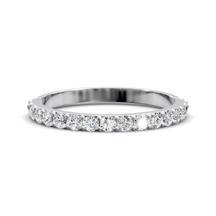 Half eternity band with prong set round diamonds in classic wedding style
