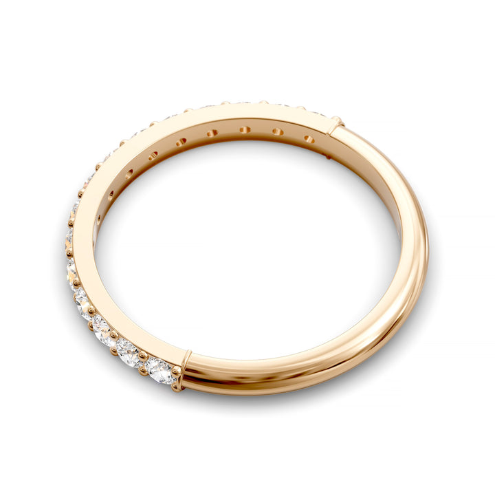 Half eternity band with prong set round diamonds in classic wedding style