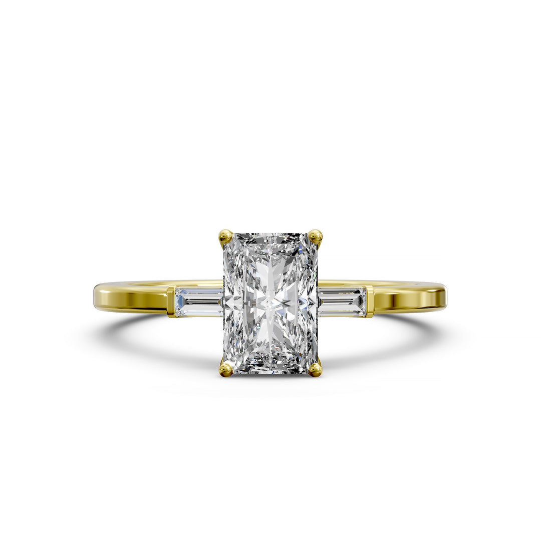Radiant cut three stone engagement ring with tapered side diamonds.