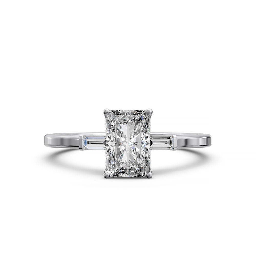 Radiant cut three stone engagement ring with tapered side diamonds.