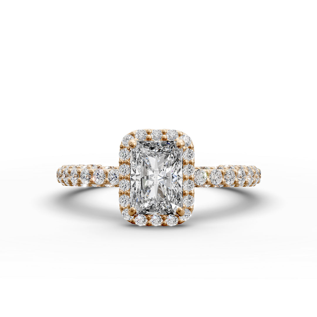 Radiant-cut diamond halo engagement ring with triple prong-set diamond band shown in display view.
