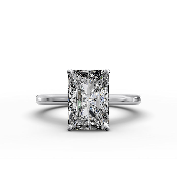 Radiant diamond hidden halo cathedral engagement ring shown in angled display view.