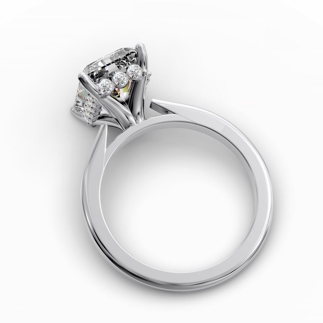 Radiant diamond hidden halo cathedral engagement ring shown in angled display view.