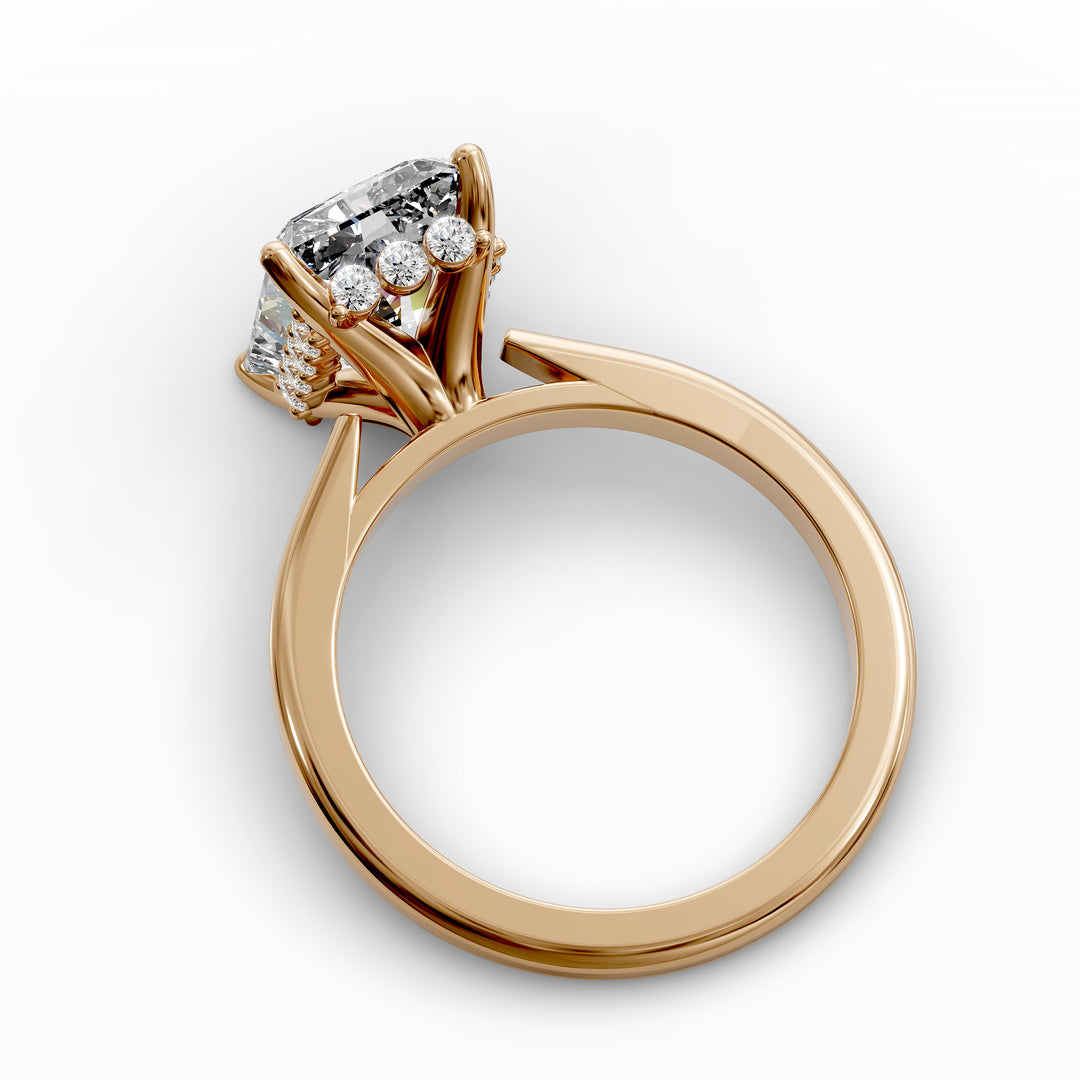 Radiant diamond hidden halo cathedral engagement ring shown in angled display view.