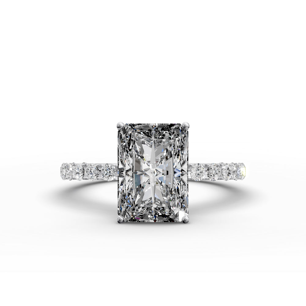 Radiant diamond pavé engagement ring with elongated center stone displayed from multiple angles.