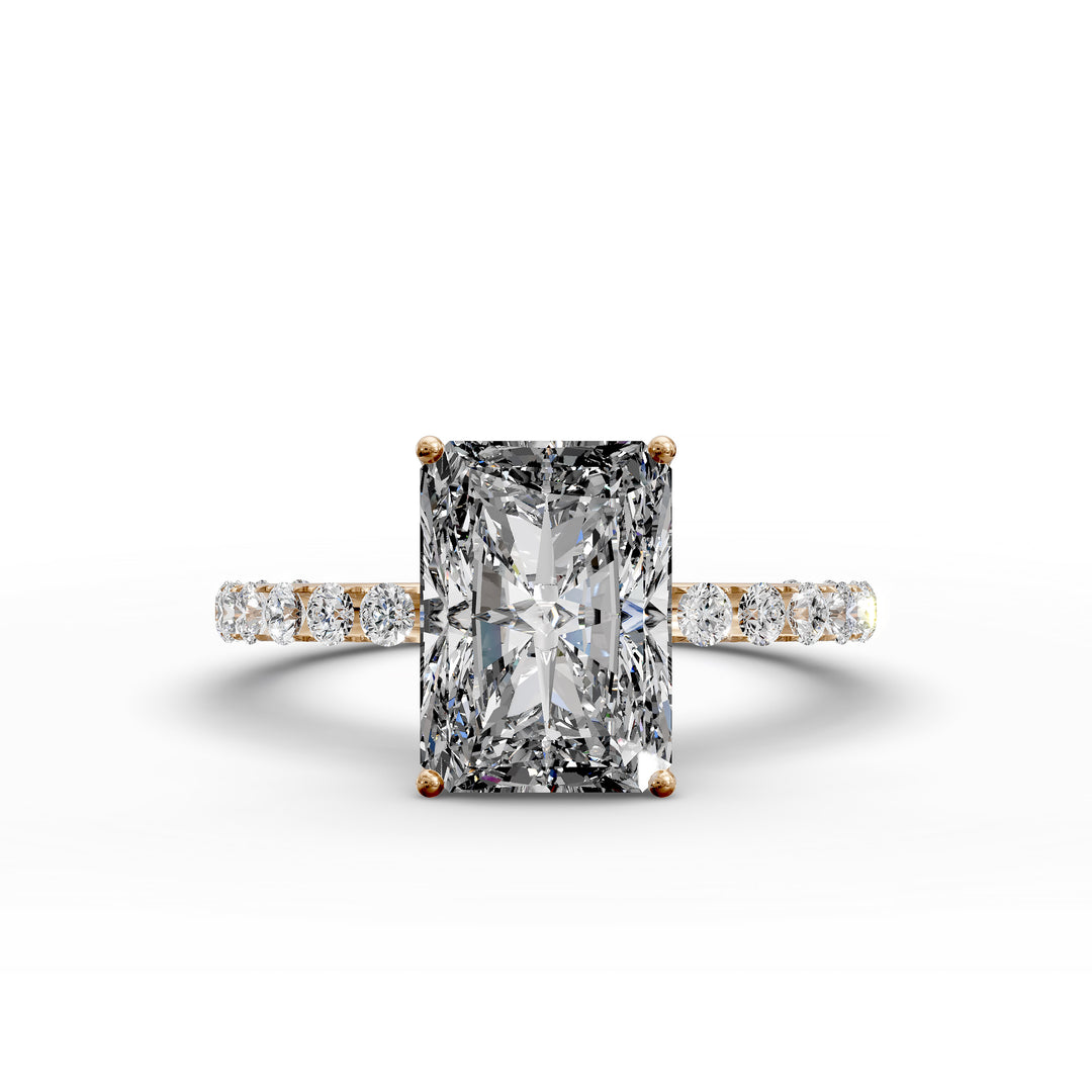 Radiant diamond pavé engagement ring with elongated center stone displayed from multiple angles.