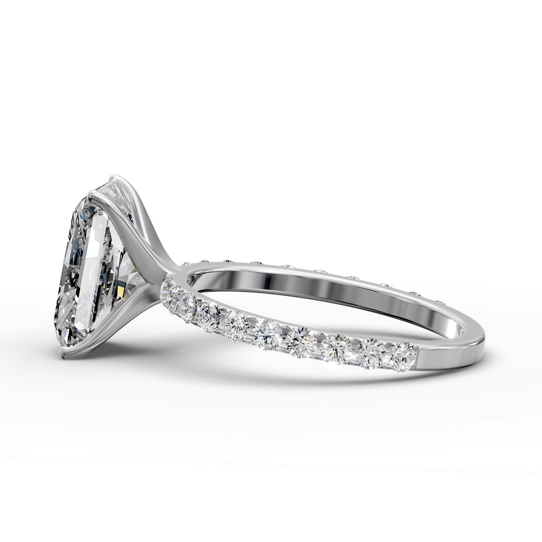 Radiant diamond pavé engagement ring with elongated center stone displayed from multiple angles.