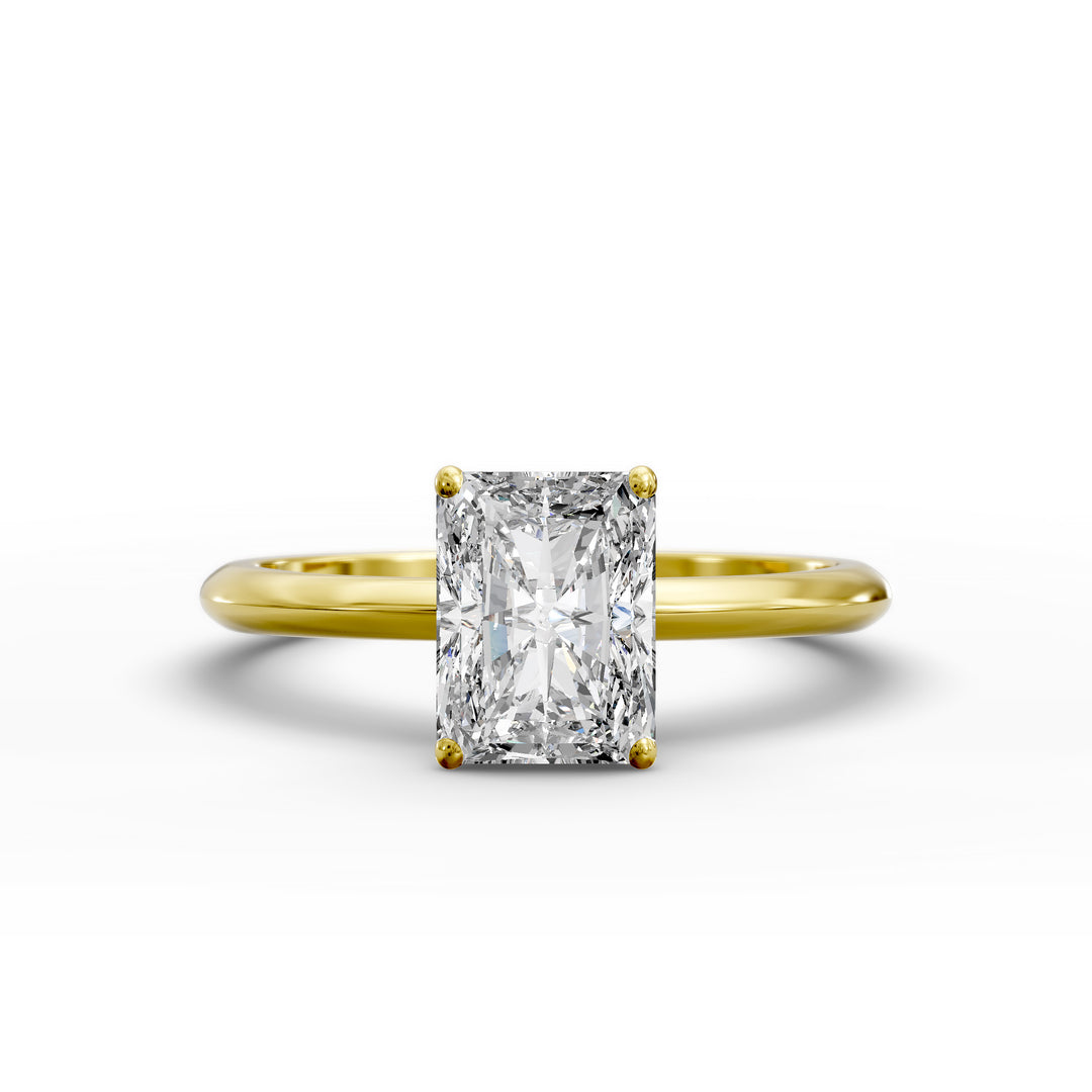 Radiant cut diamond solitaire engagement ring with a classic smooth band shown in display view.