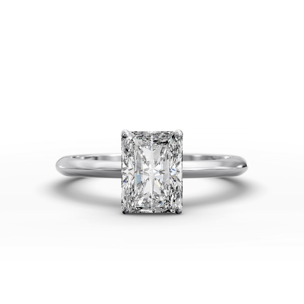 Radiant cut diamond solitaire engagement ring with a classic smooth band shown in display view.