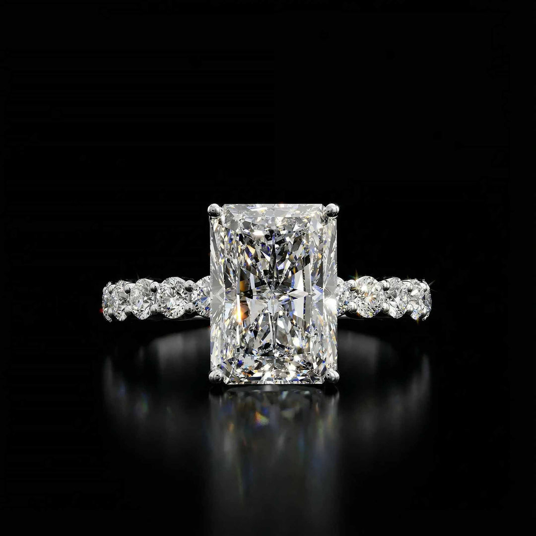 Radiant diamond hidden halo engagement ring with diamonds on band shown in display view.