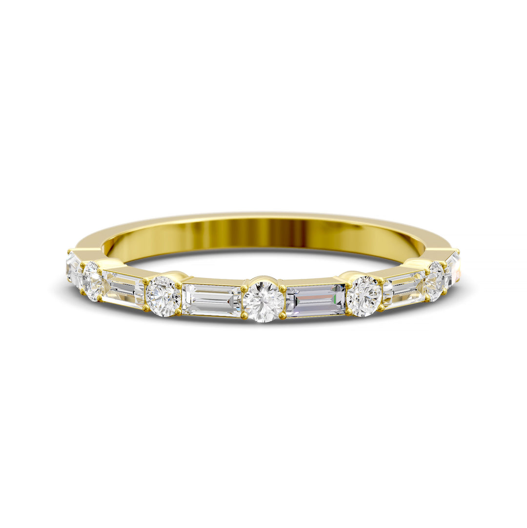 Modern gold wedding band with alternating round and baguette-cut diamonds