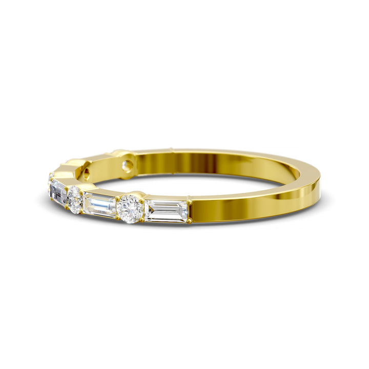 Modern gold wedding band with alternating round and baguette-cut diamonds