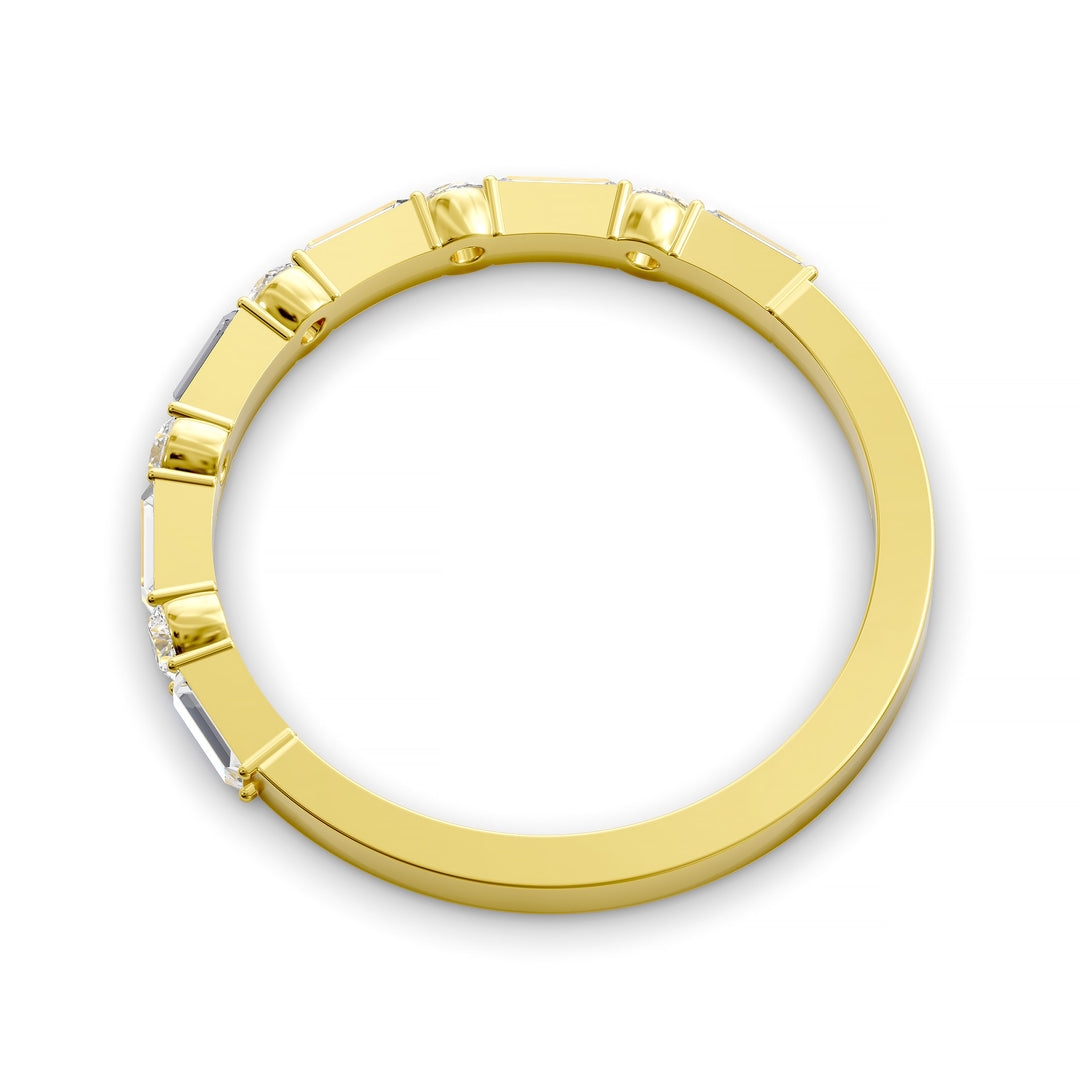Modern gold wedding band with alternating round and baguette-cut diamonds