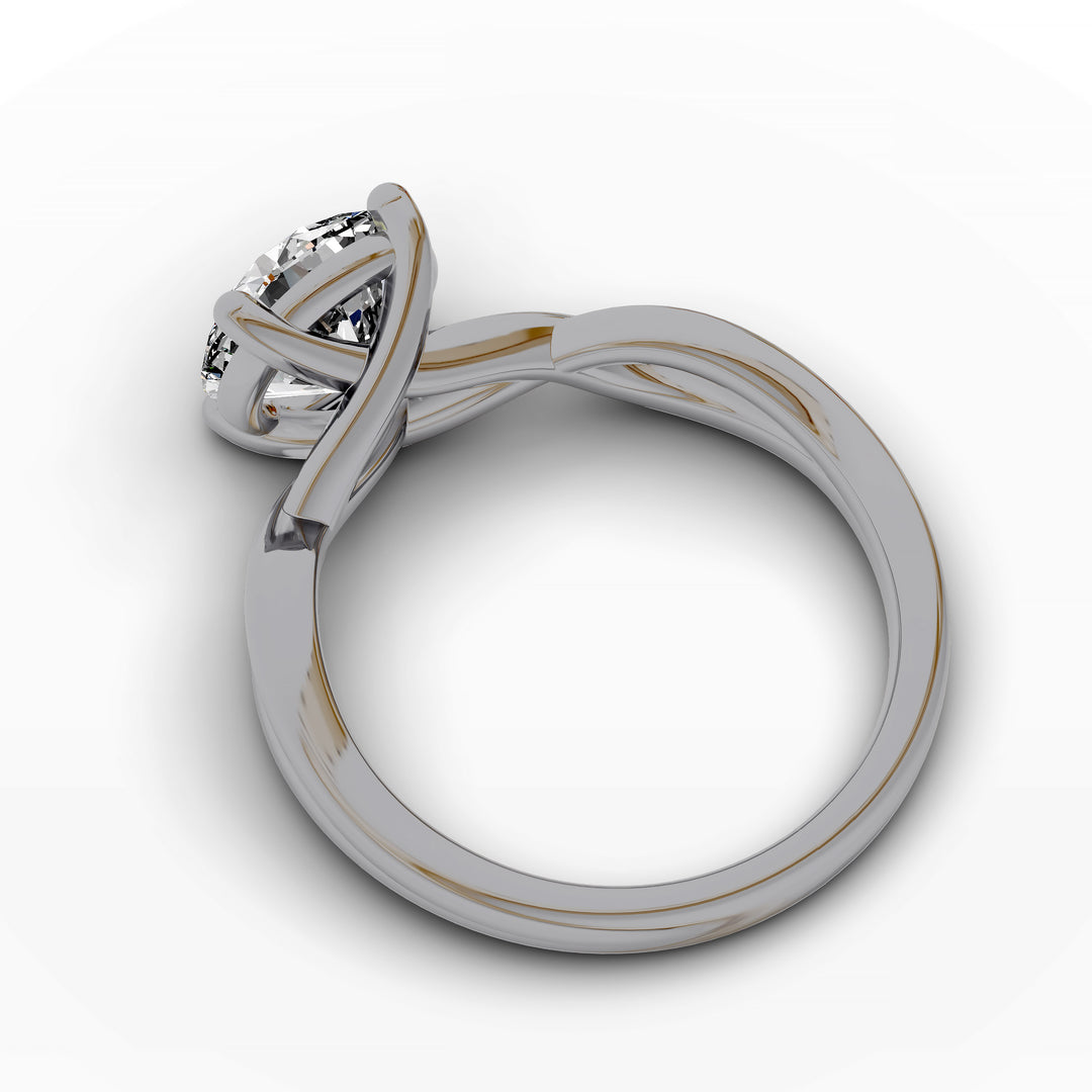 Round diamond engagement ring with infinity twist band front view.