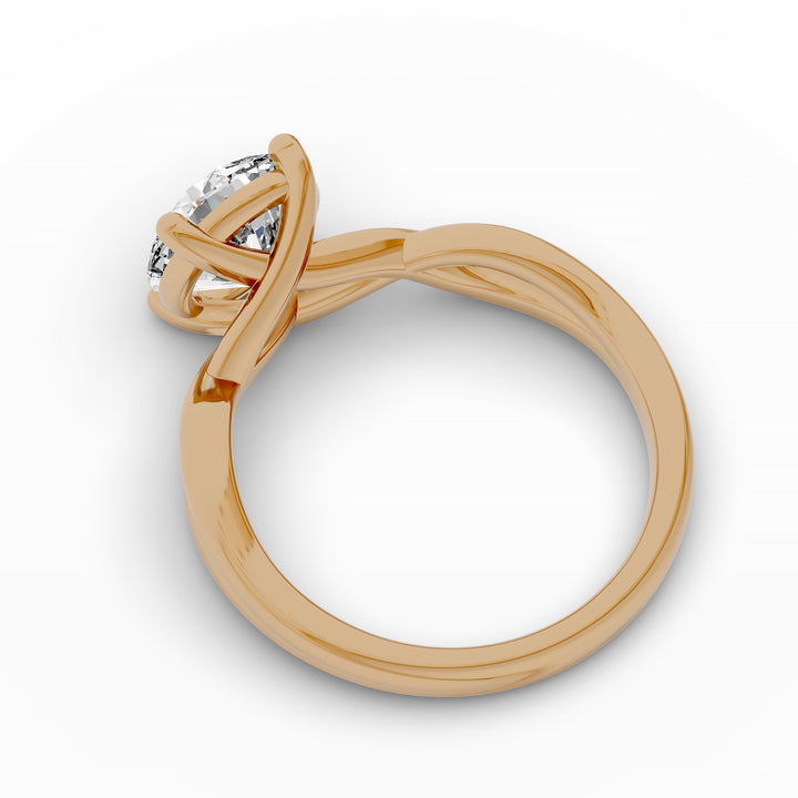 Round diamond engagement ring with infinity twist band front view.