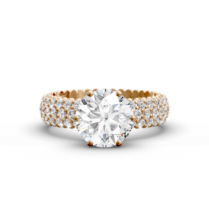 Round diamond engagement ring with six-prong crown setting and multi-row diamond band shown in studio lighting.