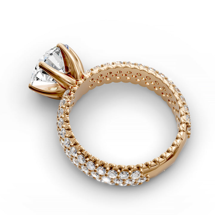 Round diamond engagement ring with six-prong crown setting and multi-row diamond band shown in studio lighting.