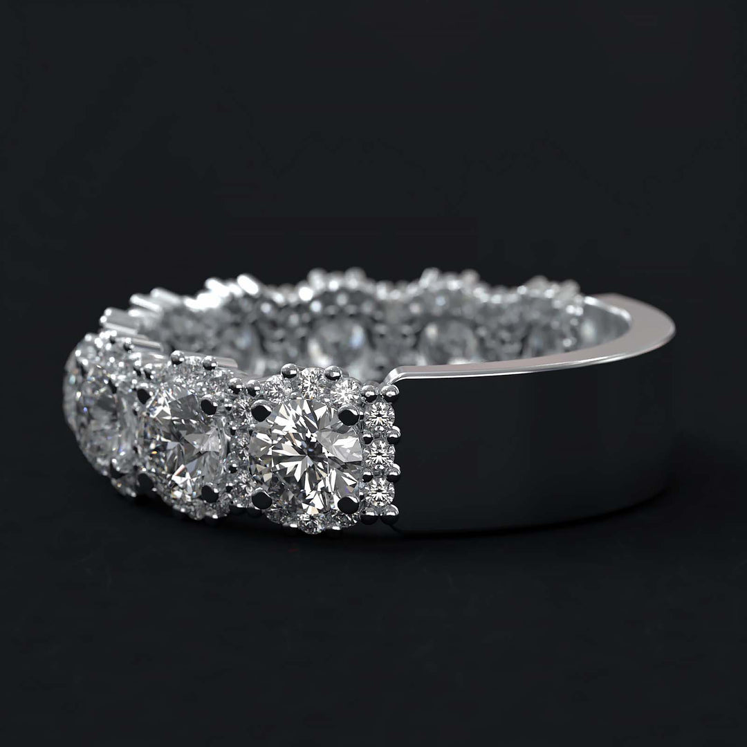 A luxurious diamond band with 9 lab-grown round diamonds surrounded by delicate halos, set in gold or platinum.