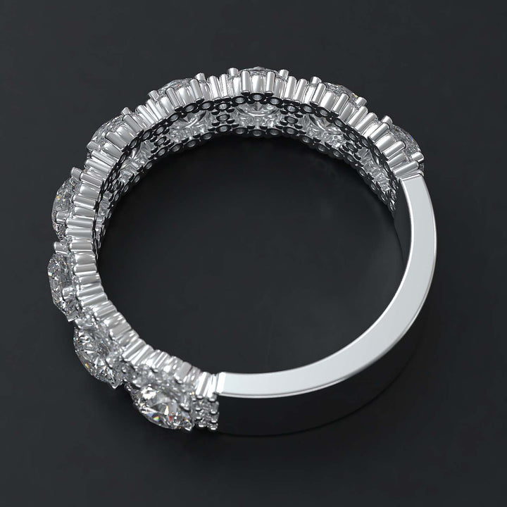 A luxurious diamond band with 9 lab-grown round diamonds surrounded by delicate halos, set in gold or platinum.