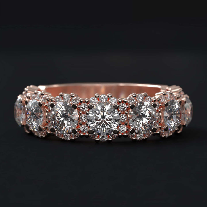 A luxurious diamond band with 9 lab-grown round diamonds surrounded by delicate halos, set in gold or platinum.