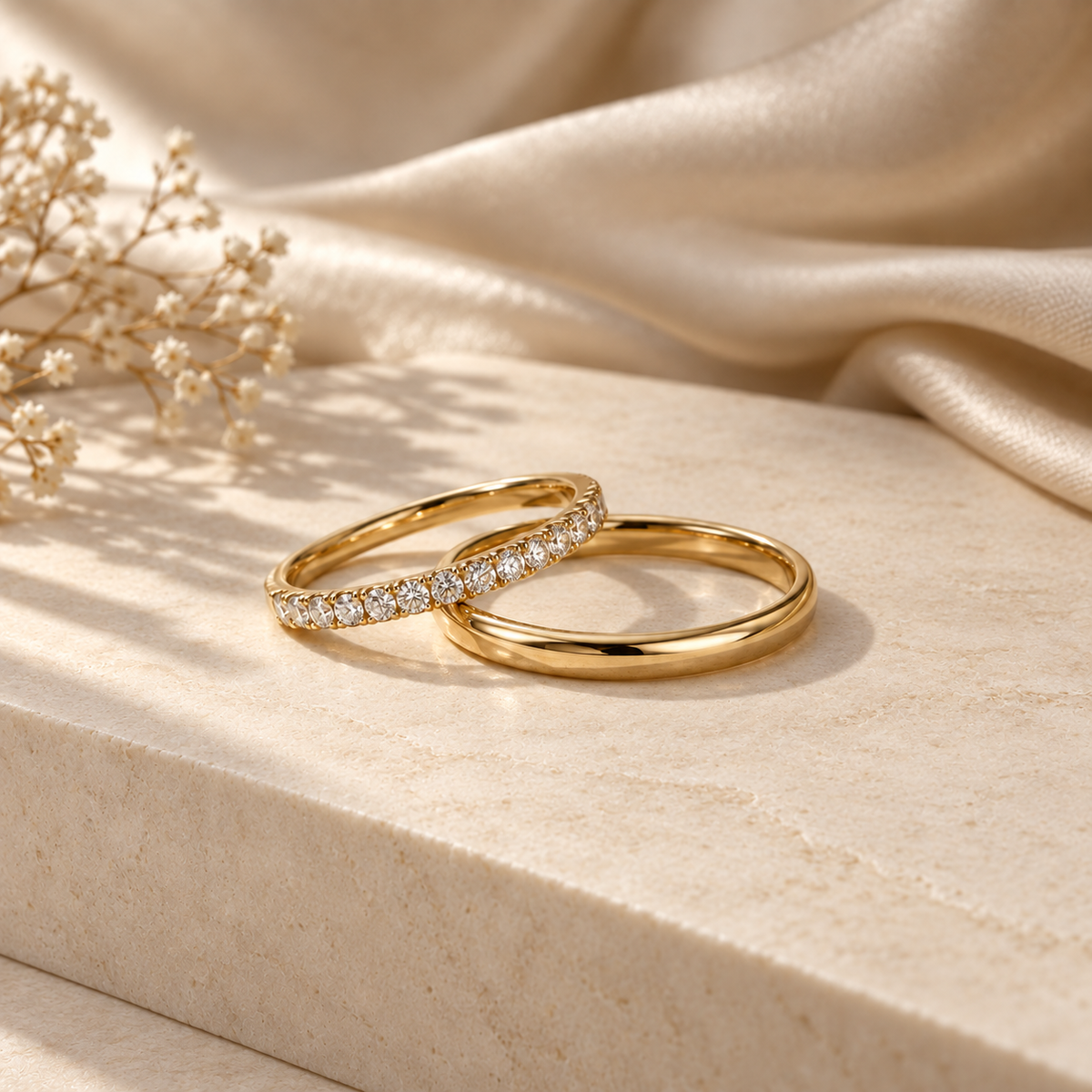 Wedding bands for her on smooth natural ivory stone