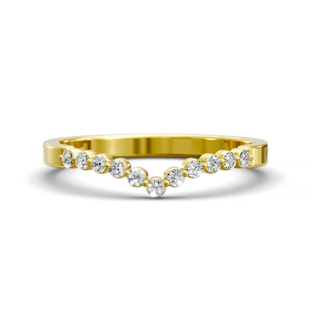 V-shaped gold wedding band with shared prong floating diamonds