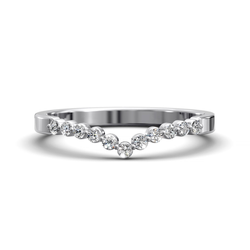 V-shaped gold wedding band with shared prong floating diamonds