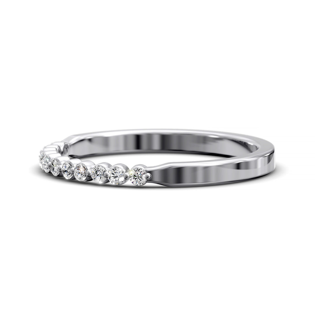 Tapered band with shared prong set round diamonds in minimalist design