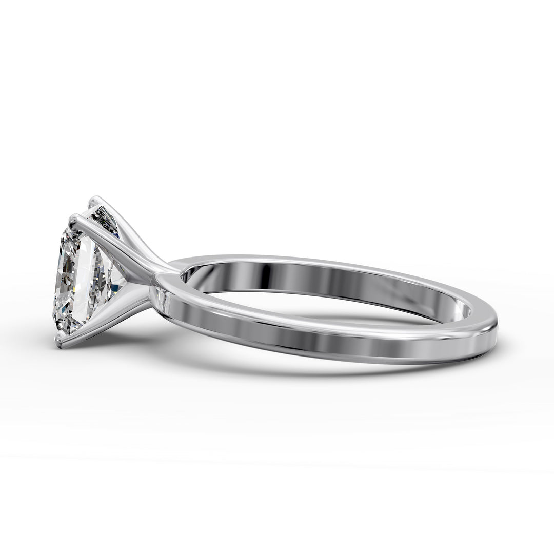 Square radiant diamond solitaire engagement ring shown in front view.