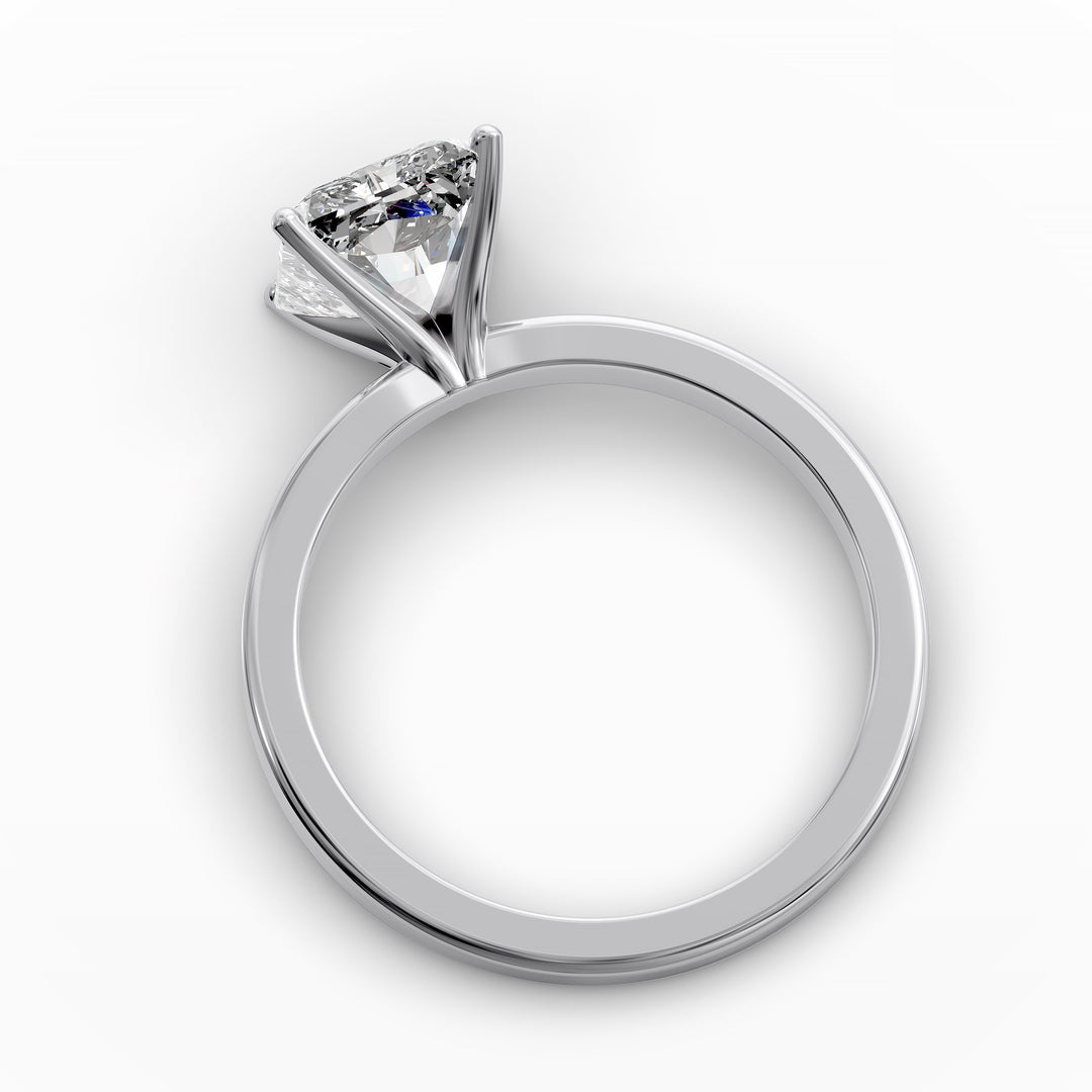 Square radiant diamond solitaire engagement ring shown in front view.