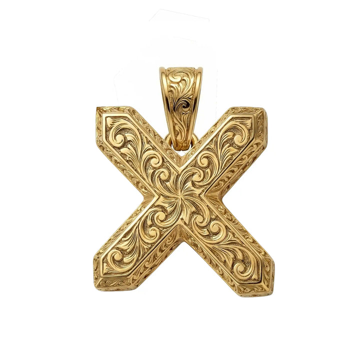 St. Andrew diagonal cross pendant with engraved ornamental design displayed on white background.