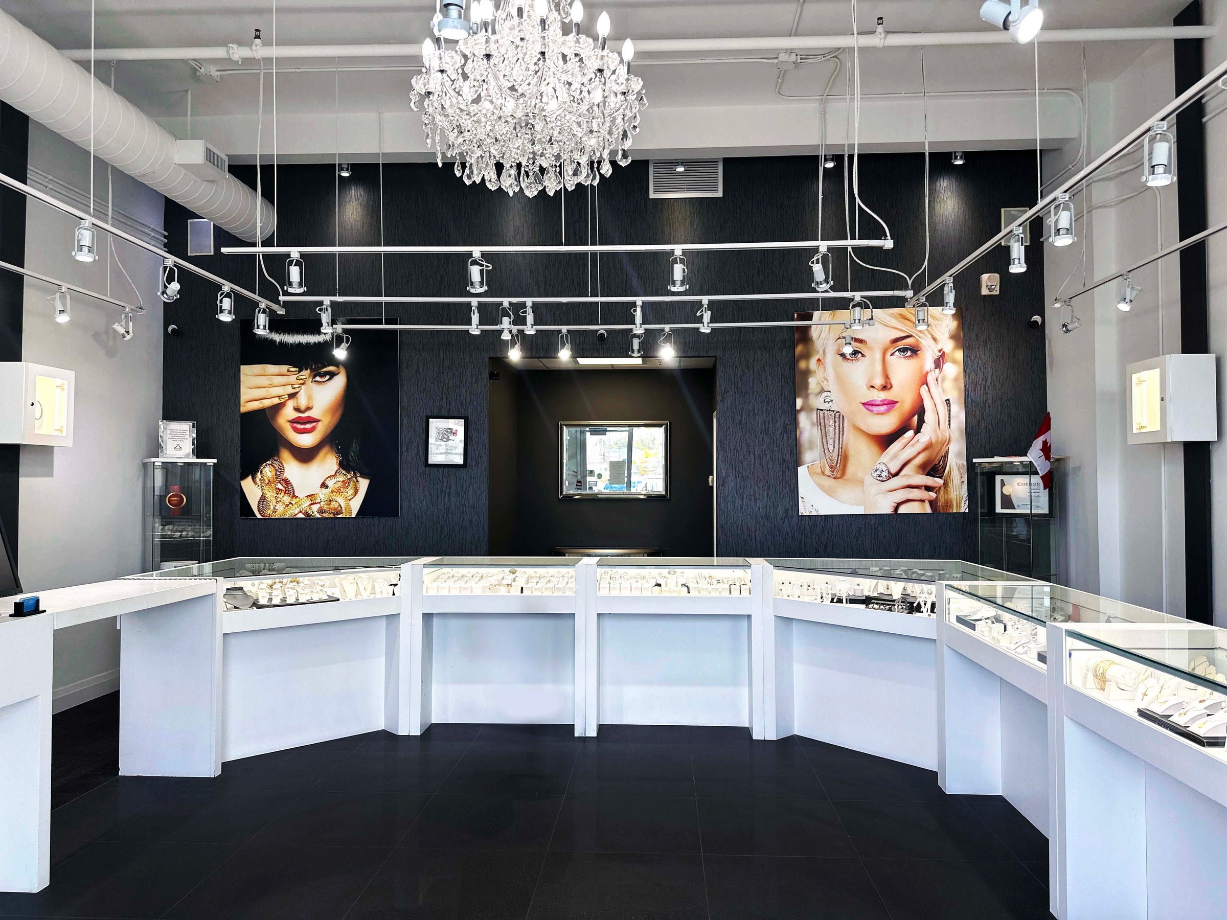 Interior of Rudix Jewellery in Hamilton, Ontario, with elegant jewelry displays and striking wall art.