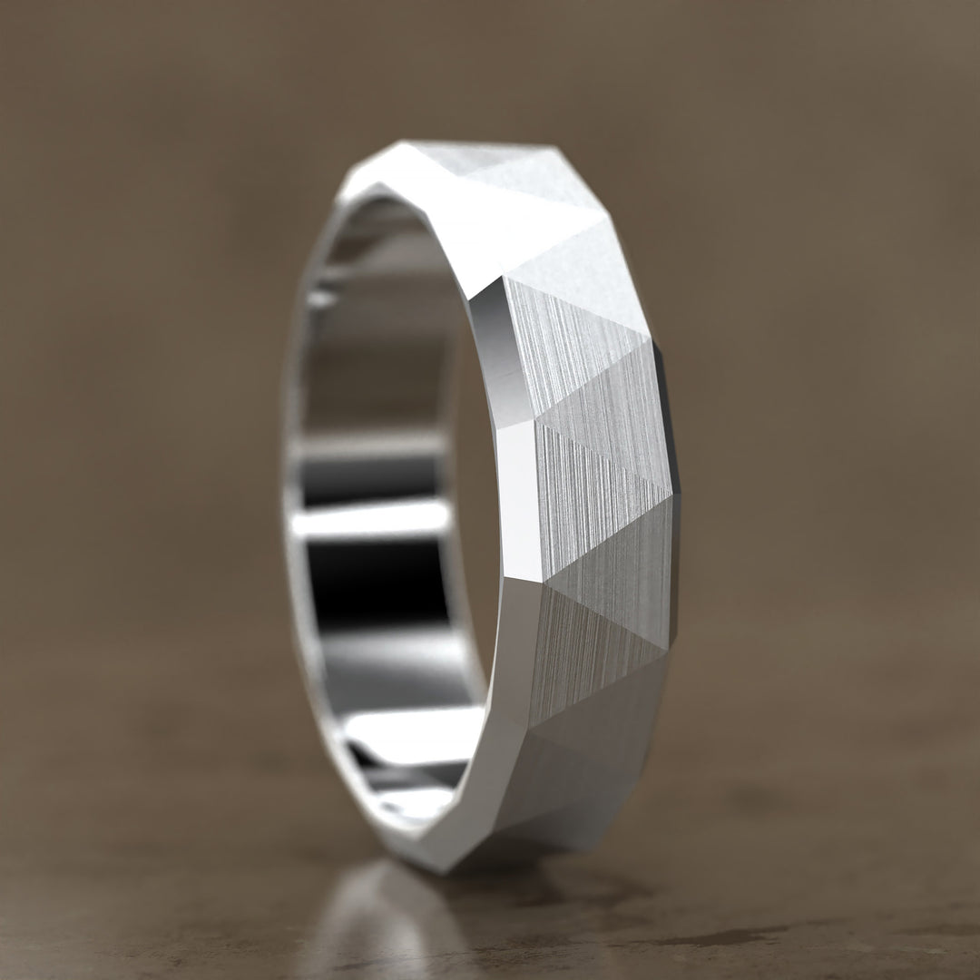 faceted geometric band with brushed triangular pattern