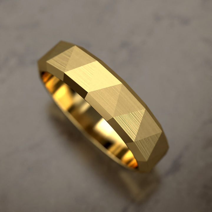 faceted geometric band with brushed triangular pattern