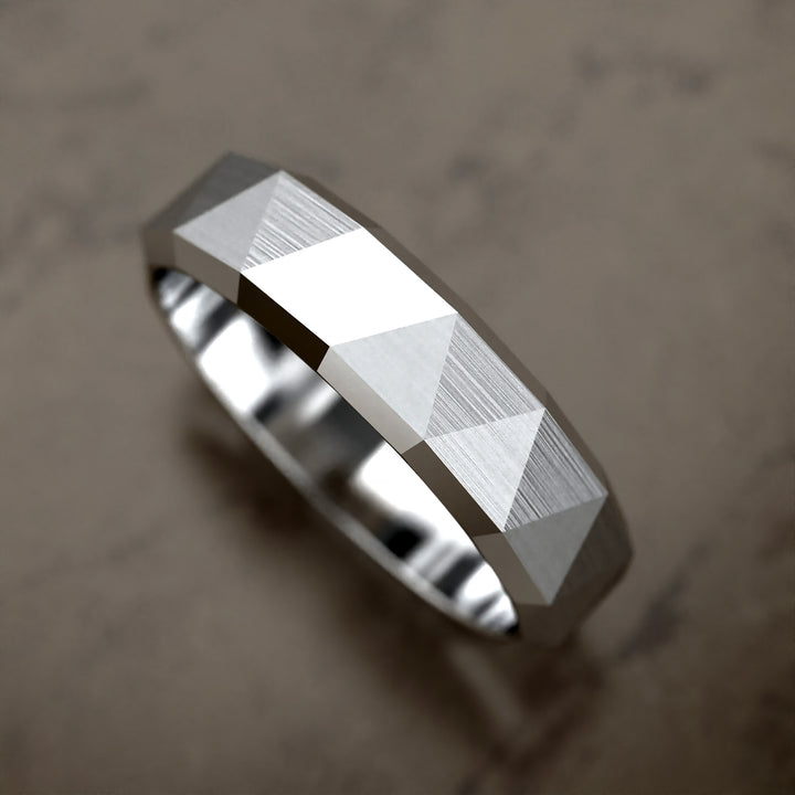 faceted geometric band with brushed triangular pattern