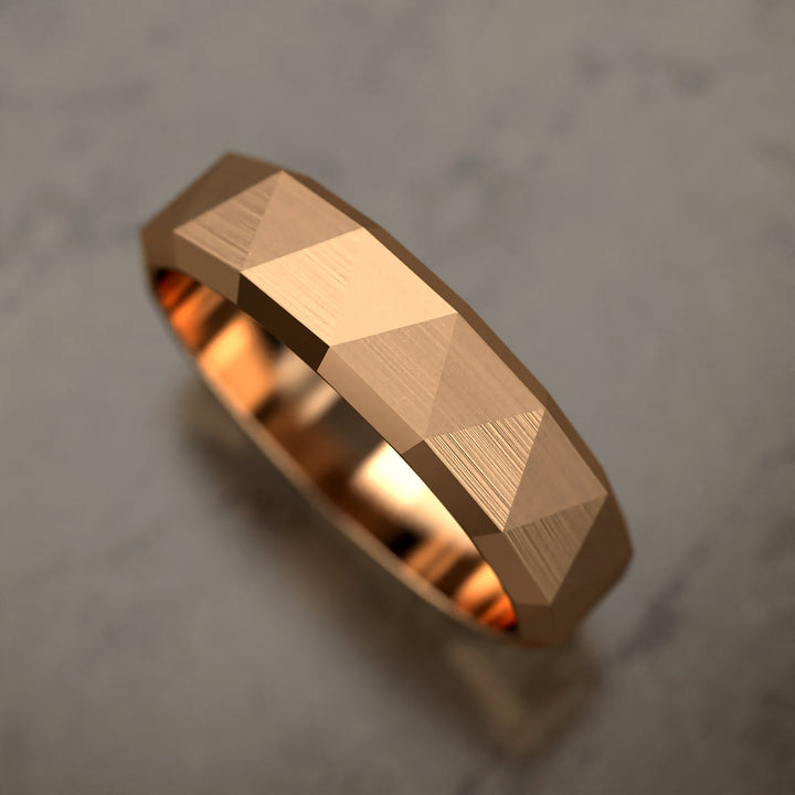 faceted geometric band with brushed triangular pattern