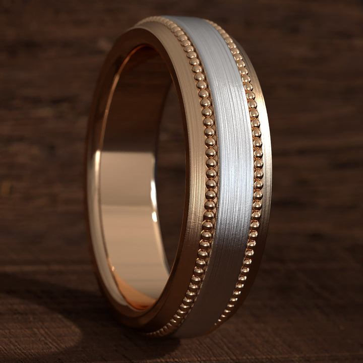 Two-tone hammered wedding band with milgrain edges