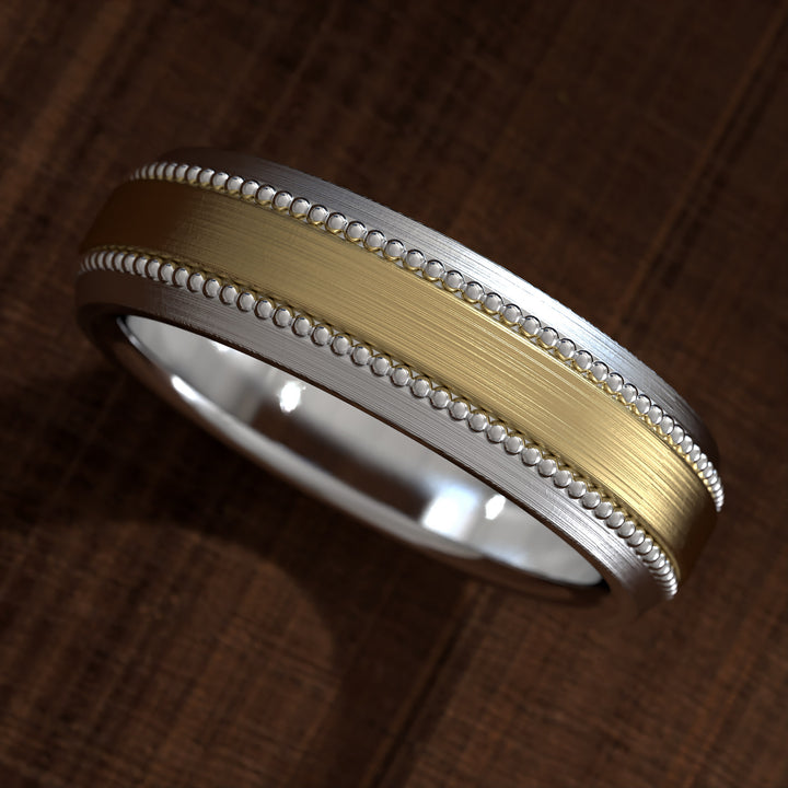 Two-tone hammered wedding band with milgrain edges